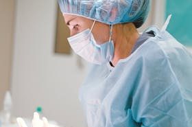 Female Doctor in Blue Scrub Suit